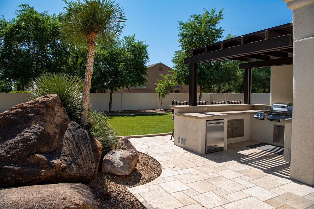 Outdoor kitchen on a paver patio